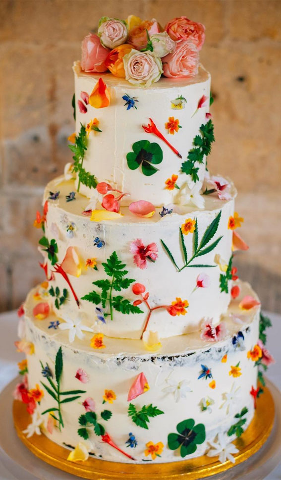 33 Edible Flower Cakes That’re Simple But Outstanding : Three-Tiered Wedding Cake Topped with Roses