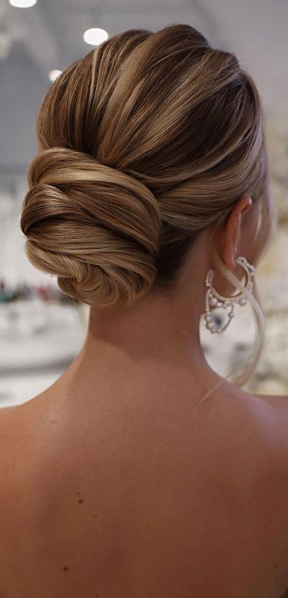 40 Updo Hairstyles Perfect For Any Occasion : Classic Twist + Low Bun