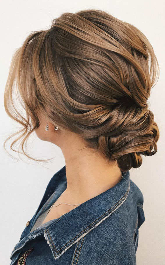 40 Updo Hairstyles Perfect For Any Occasion : Brunette Textured Low Bun