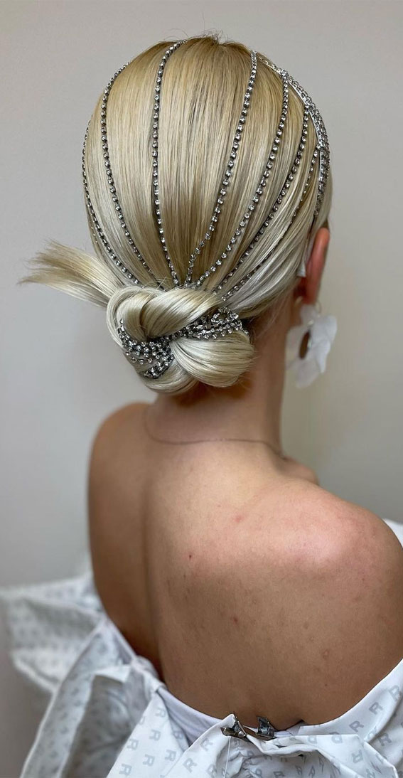 40 Updo Hairstyles Perfect For Any Occasion : Knot Low Bun with Rhinestone Chains
