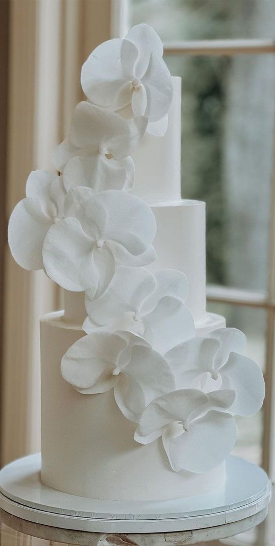 white orchid cascading wedding cake, wedding cakes, wedding cake images, beautiful wedding cakes, non traditional wedding cake, wedding cake trends