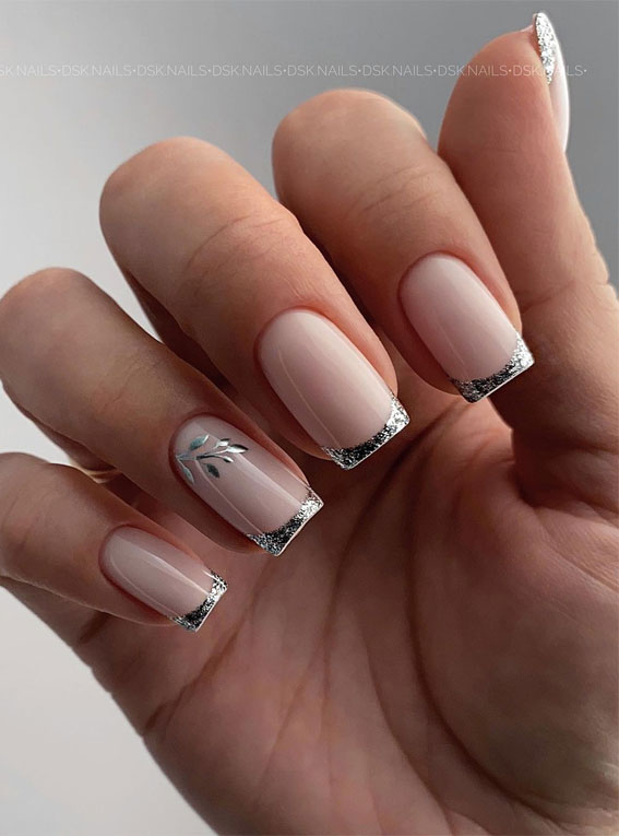 Indulge in the Classic Elegance of French Nails : Silver French Tips with Leaf