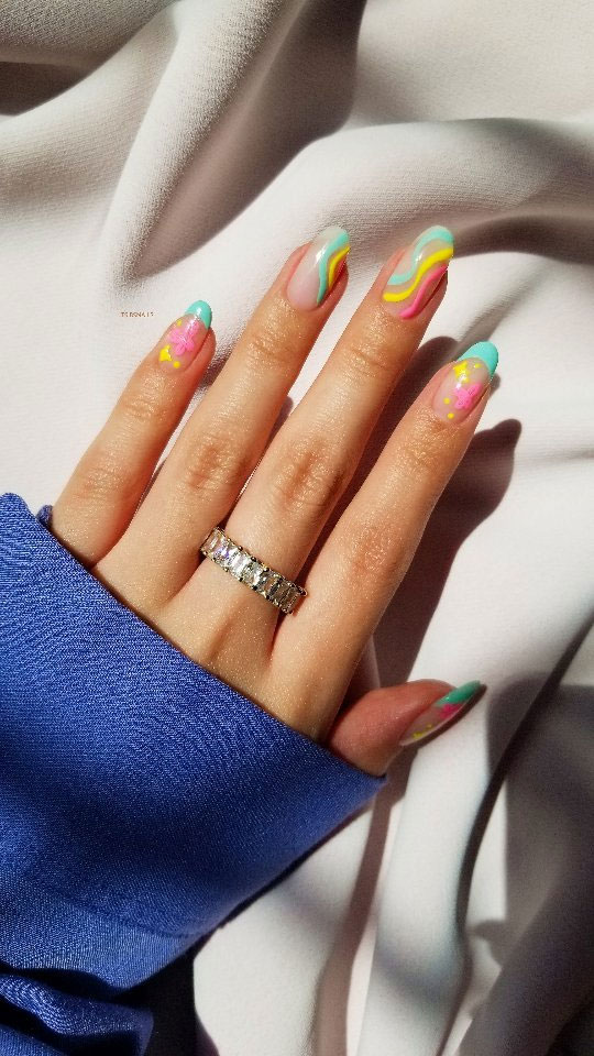 Embrace the Warmth with Radiant Summer Nails : Neon Swirl + Flowers