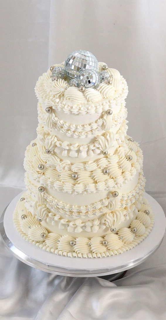 47 Buttercream Cake Ideas for Every Celebration : All white, two tiered beauty