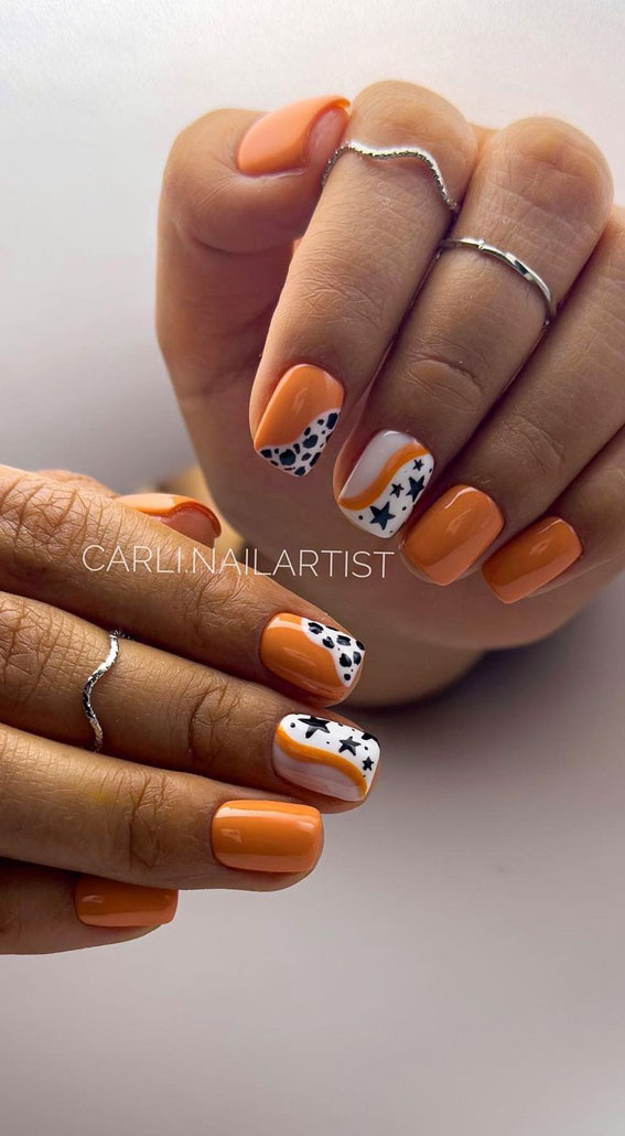 50 Rock Your Style with Trendy Nail Designs : Orange Short Nails with Black Starry