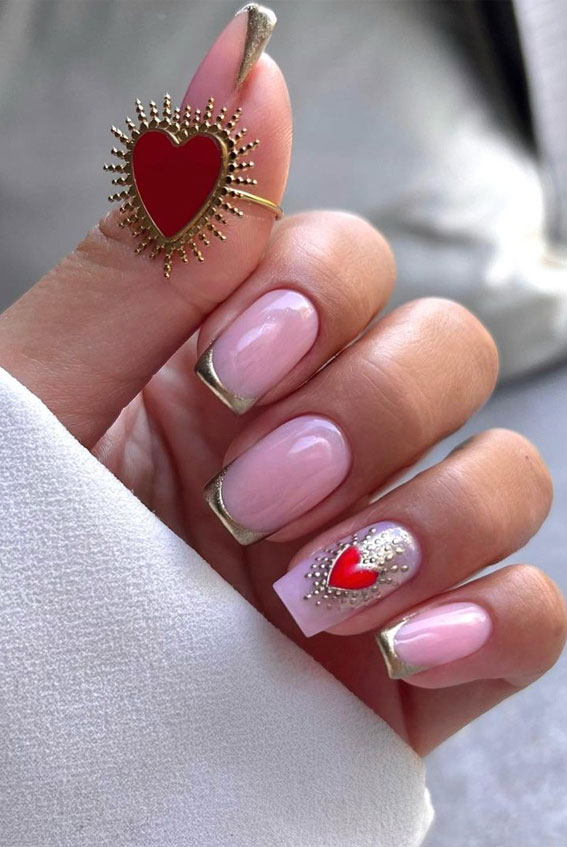 50 Rock Your Style with Trendy Nail Designs : Sleek Chrome Tips with Heart Accents