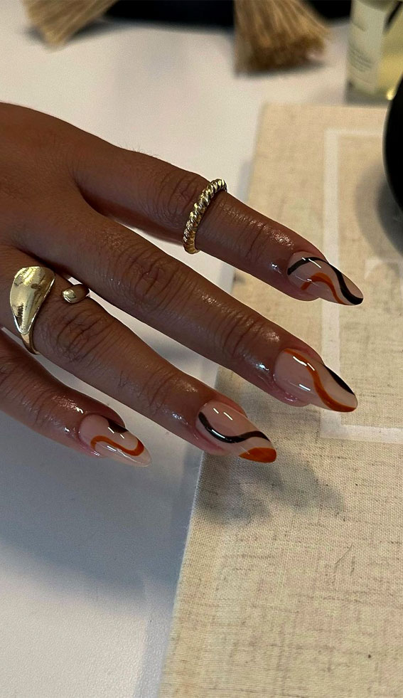 Embrace Autumn with Stunning Nail Art Ideas : Black and Brown Swirl Sheer Nails