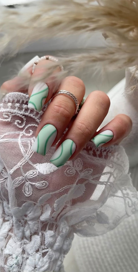 Embrace Autumn with Stunning Nail Art Ideas : Light Green Nails