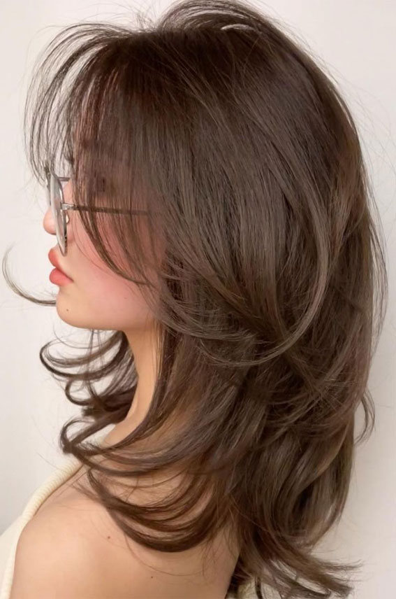 50 Chic and Versatile Medium Layered Haircut Ideas : Soft Feathered Layers with Bangs