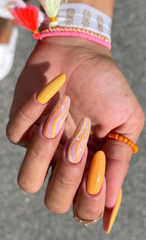 Chic Summer Nail Ideas Embrace the Season with Style : Yellow Swirl Almond Nails