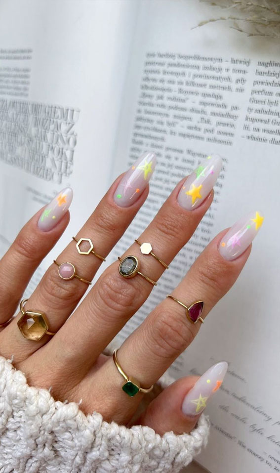 Chic Summer Nail Ideas Embrace the Season with Style : Neon Stars Sheer Nails
