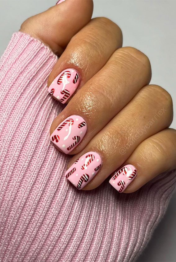 Winter Wonders 49 Festive Christmas Nail Art Designs : Candy Cane on Pink Nails