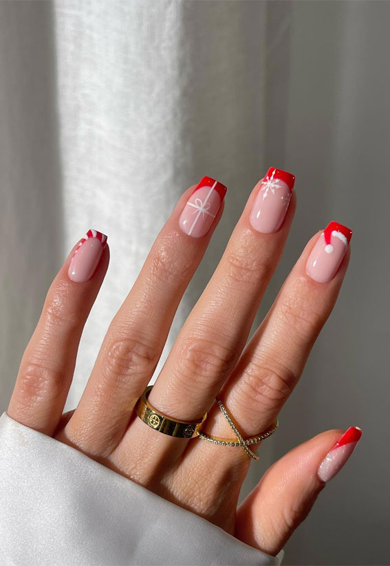 Festive Fingertips 52 Enchanting Christmas Nail Ideas : Red Candy Cane + Santa Hat French Tips