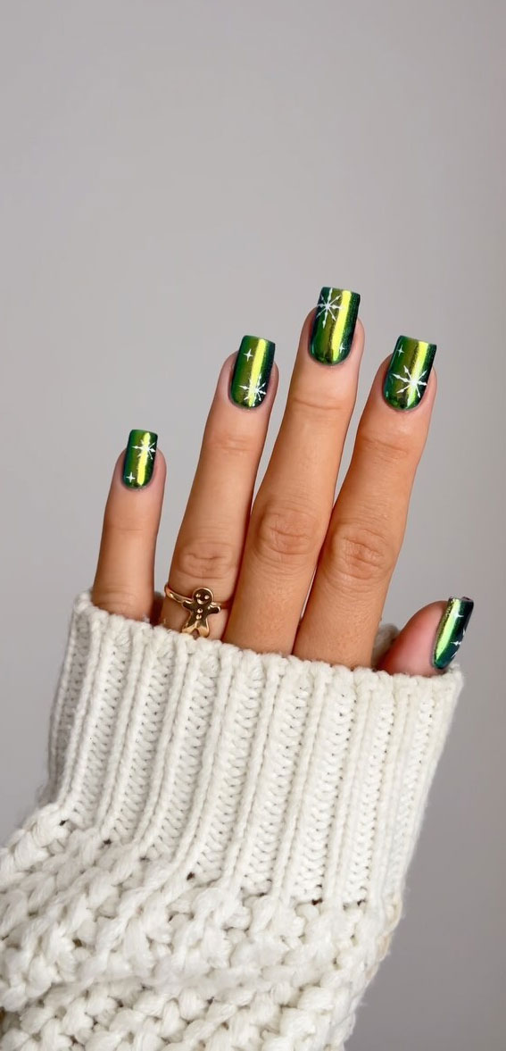 Festive Fingertips 52 Enchanting Christmas Nail Ideas : Green Chrome Nails with Snowflake
