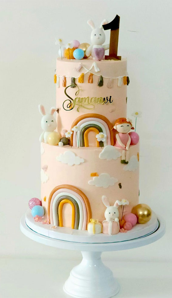 50+ Delightful 1st Birthday Cake Ideas for “Sweet Beginnings” : Bunny & Rainbow Two Tiers