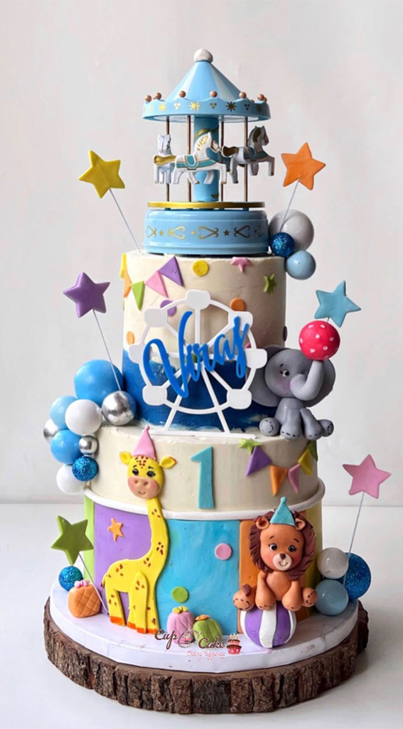 50+ Delightful 1st Birthday Cake Ideas for “Sweet Beginnings” : Colourful Carnival-Themed Cake