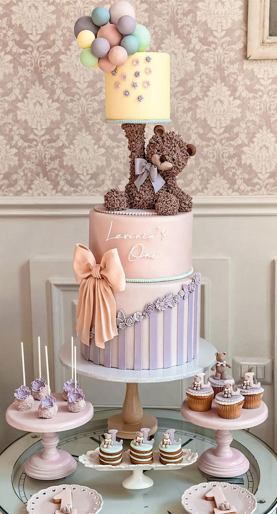 50+ Delightful 1st Birthday Cake Ideas for “Sweet Beginnings” : Teddy Lift The Cake