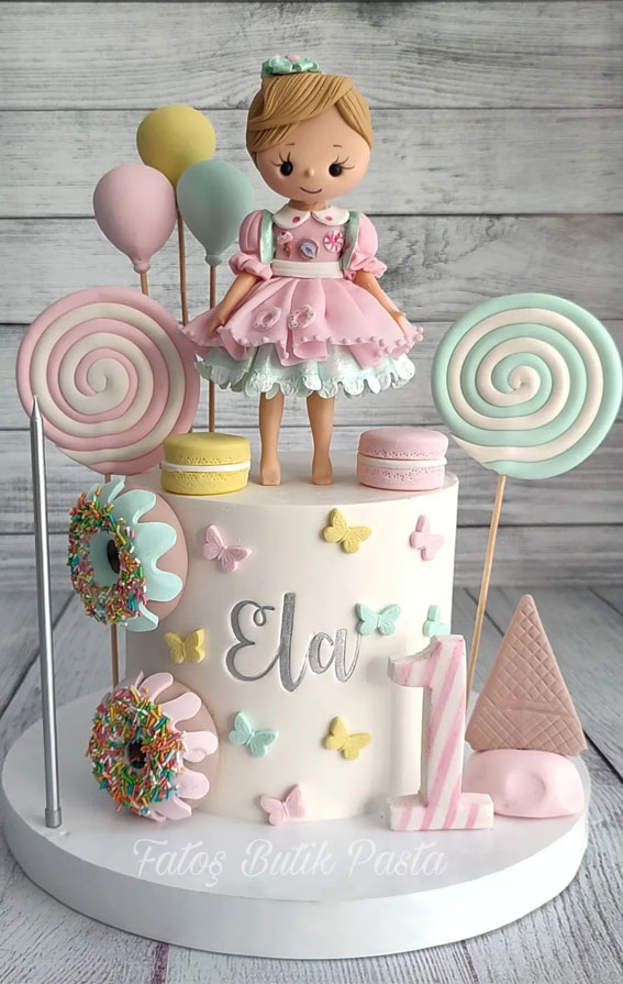 50+ Delightful 1st Birthday Cake Ideas for “Sweet Beginnings” : Pastel Candy Land Cake