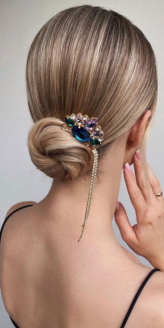 40 Timeless and Elegant Updo Hairstyles : Low Bun with an Elegant Accessories