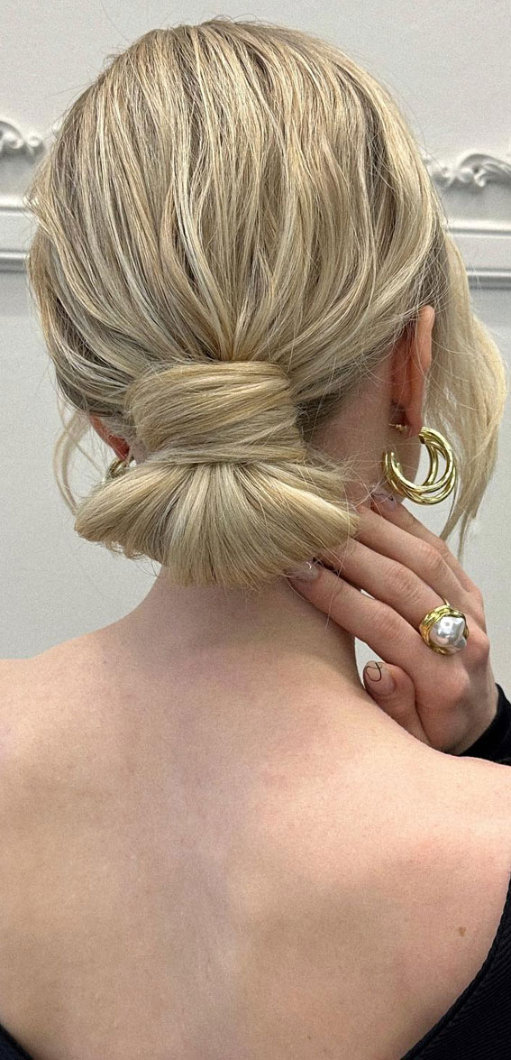 40 Timeless and Elegant Updo Hairstyles : Textured Low Bun Champagne Blonde Hair