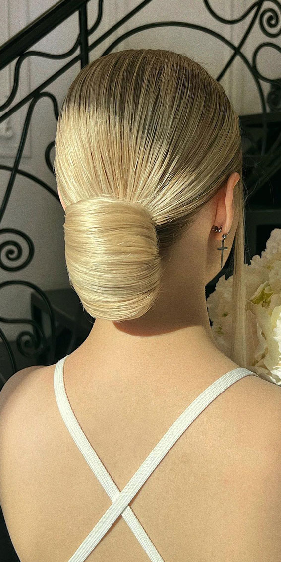 40 Timeless and Elegant Updo Hairstyles : Blonde Sleek and Simple Low Bun