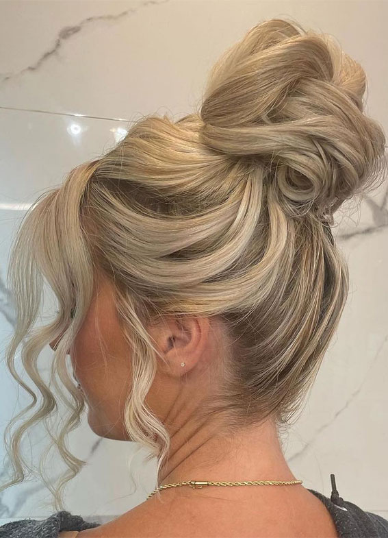 25 Stunning Hairdo Ideas for Every Special Occasion : Top Bun with Modern Twists