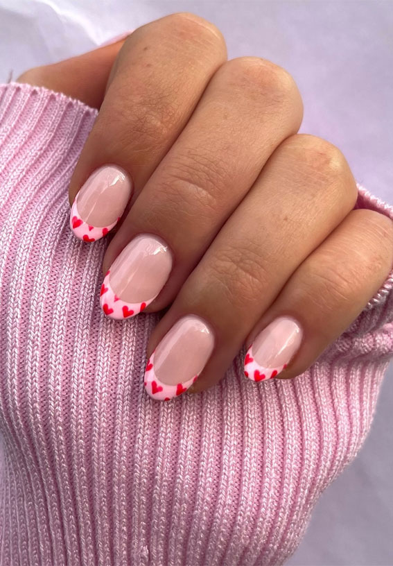 Captivating Valentine’s Day Nail Designs : Pink Tips with Small Love Hearts