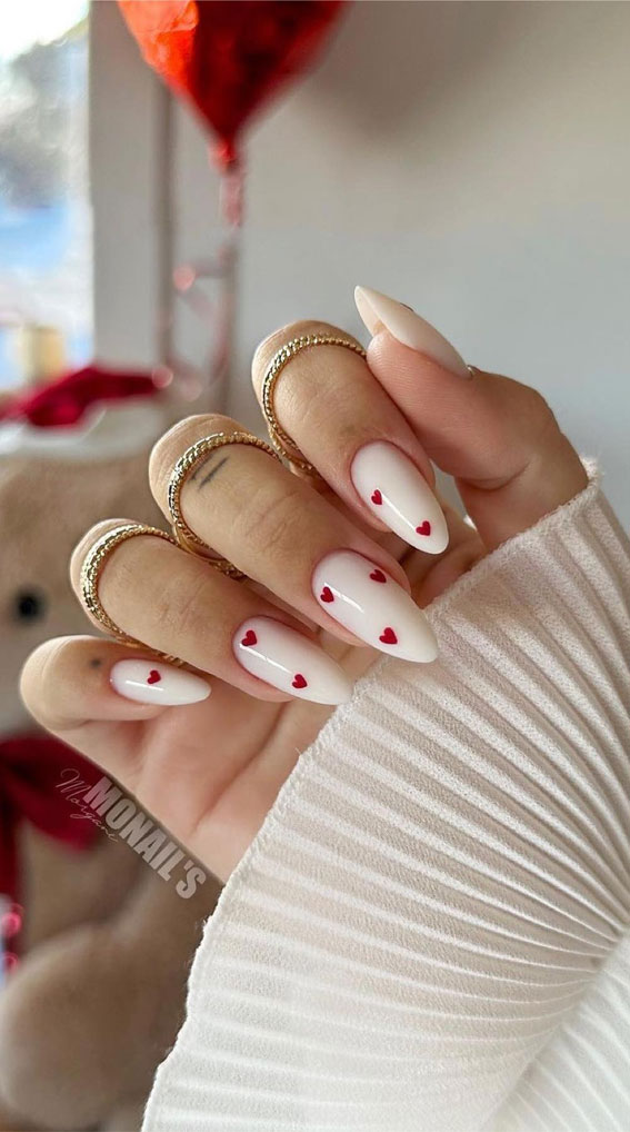 Captivating Valentine’s Day Nail Designs : Milky Nails with Love Hearts