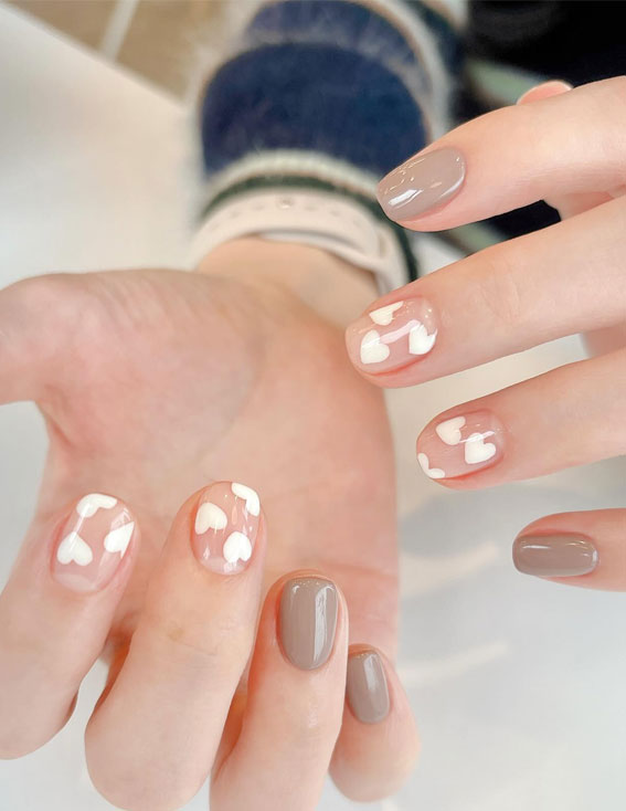 Captivating Valentine’s Day Nail Designs : Nude + White Heart Subtle Nails