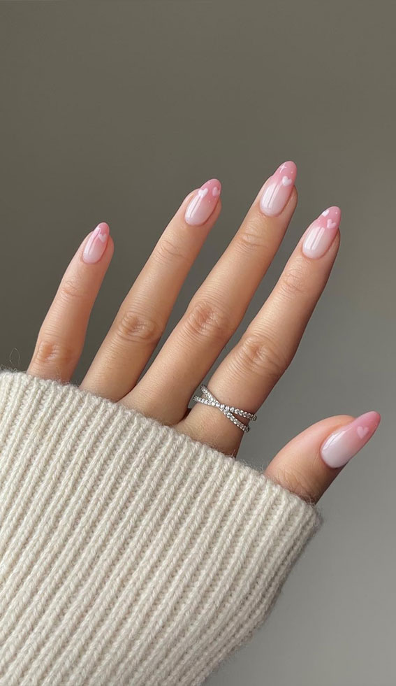 Captivating Valentine’s Day Nail Designs : Ombre Pink Tips with Love Heart Accents