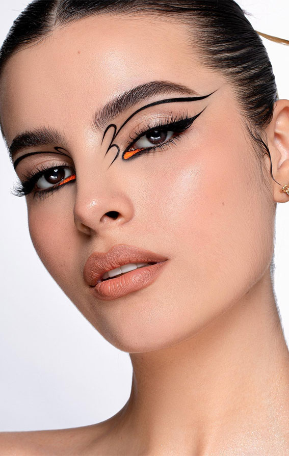 Colourful Makeup Ideas for Music Festivals : A Bold Cat Eye with a Pop of Orange