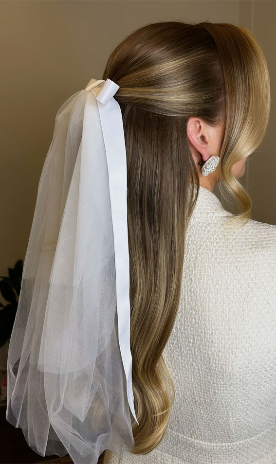 40 Half Up Half Down Hairstyles The Perfect Balance of Sophistication : Polished Soft Curl with A White Bow