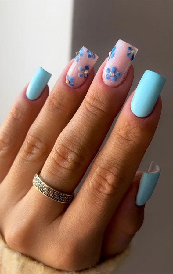 35 Trendsetting Nail Designs for the Season : Blue Flower Sheer Nails + Bright Blue Nails