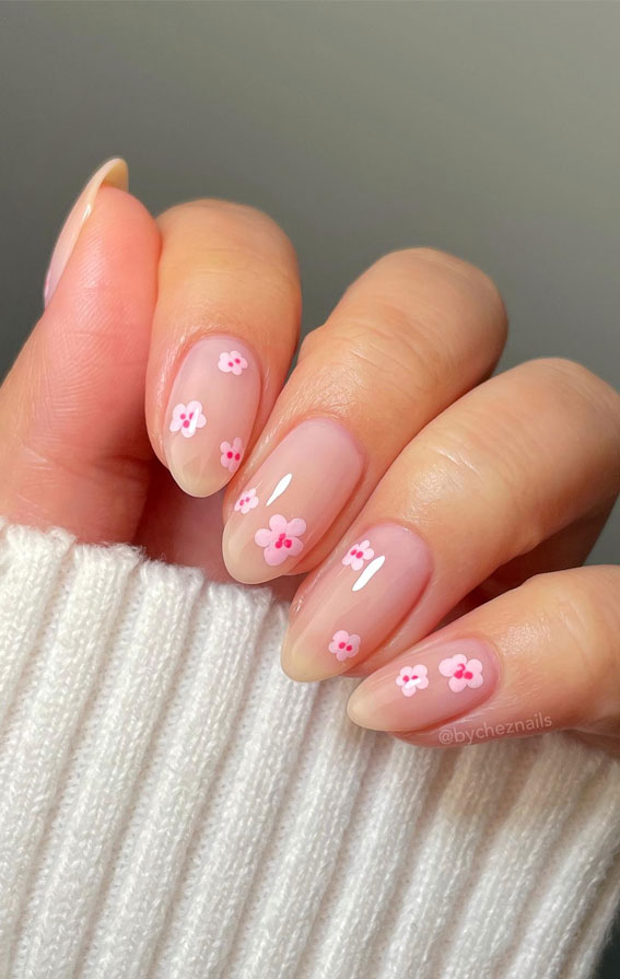 35 Trendsetting Nail Designs for the Season : Soft Pink Daisy Accent Nails