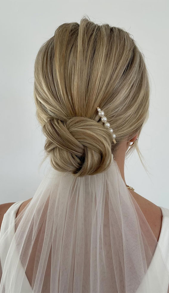Unlock Your Style 30 Hairdos to Transform Your Look : Knot Bun with Veil