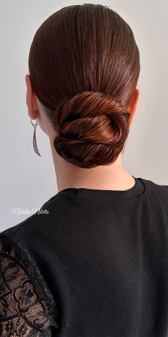 Unlock Your Style 30 Hairdos to Transform Your Look : Sophisticated Sleek Twisted Low Bun