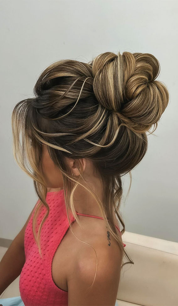 Unlock Your Style 30 Hairdos to Transform Your Look : Upstyle Bun with Loose Hair Down