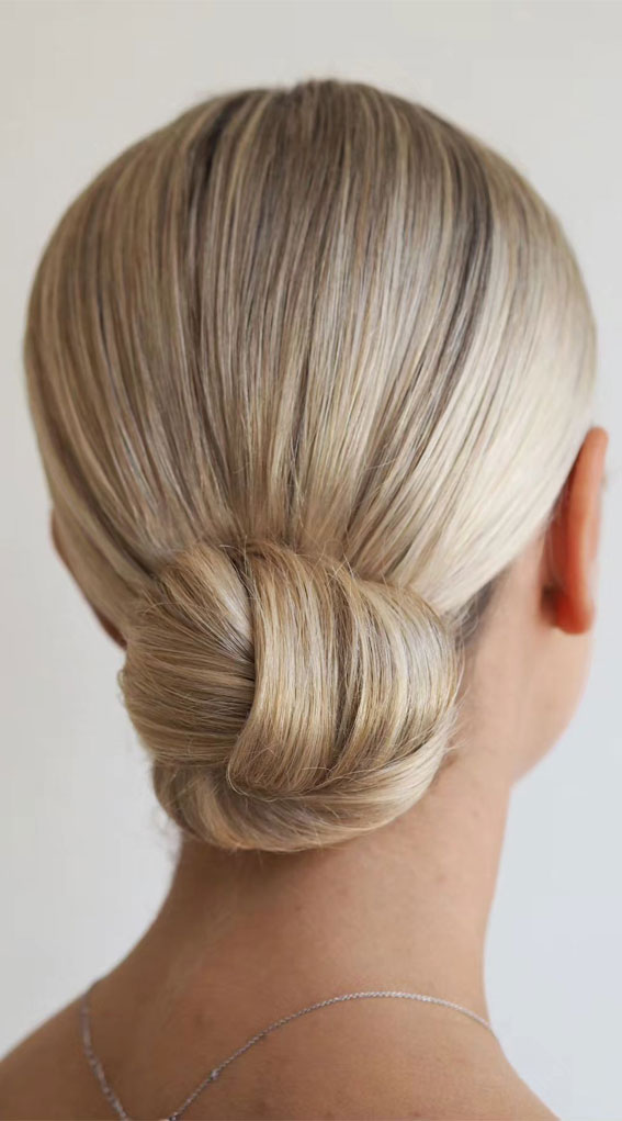 35 Creative Hairdos for Every Occasion : Sleek Knot Low Bun