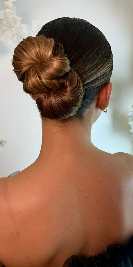 35 Creative Hairdos for Every Occasion : Clean Bow Bun with a Twist 