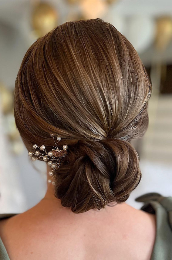 30 Stunning Bridesmaids Hairstyles for 2024 : Textured Updo with Hair Accessories