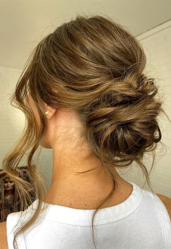 30 Stunning Bridesmaids Hairstyles for 2024 : Relaxed Messy Low Bun