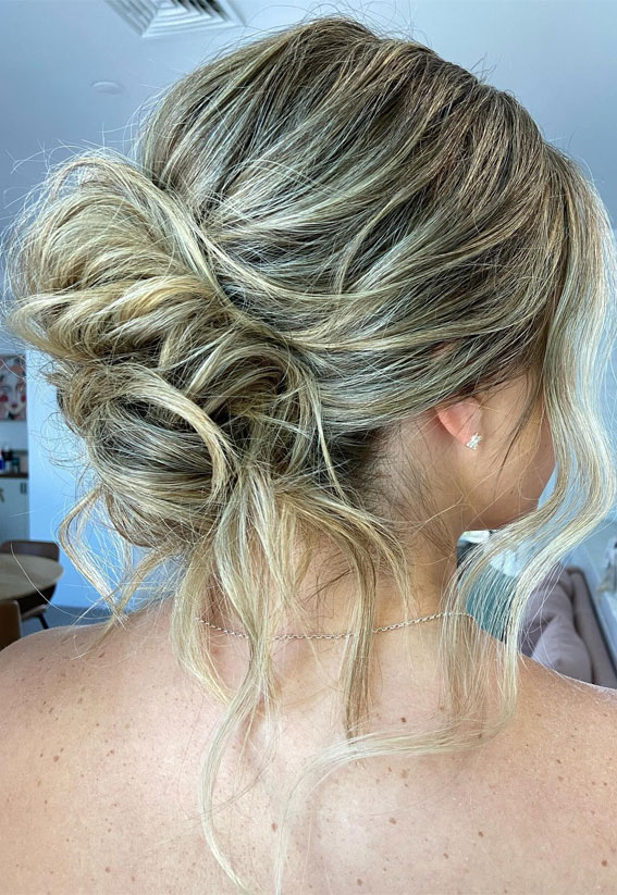 30 Stunning Bridesmaids Hairstyles for 2024 : Relaxed Undone Low Bun