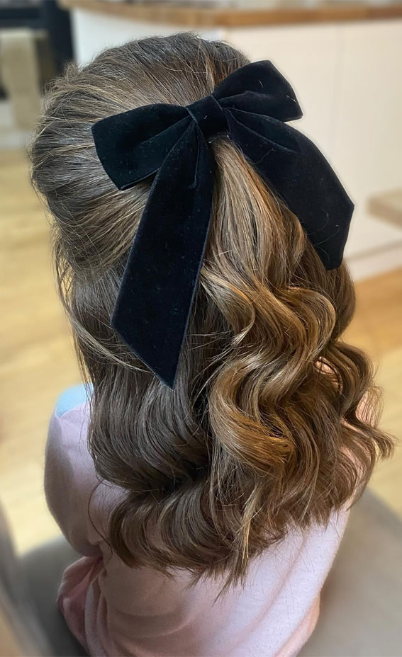 28 Enchanting Flower Girl Hairstyles : Half Up Soft Waves with Black Bow