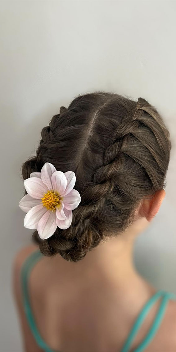 28 Enchanting Flower Girl Hairstyles : Twisted Double Braided Buns with a Flower