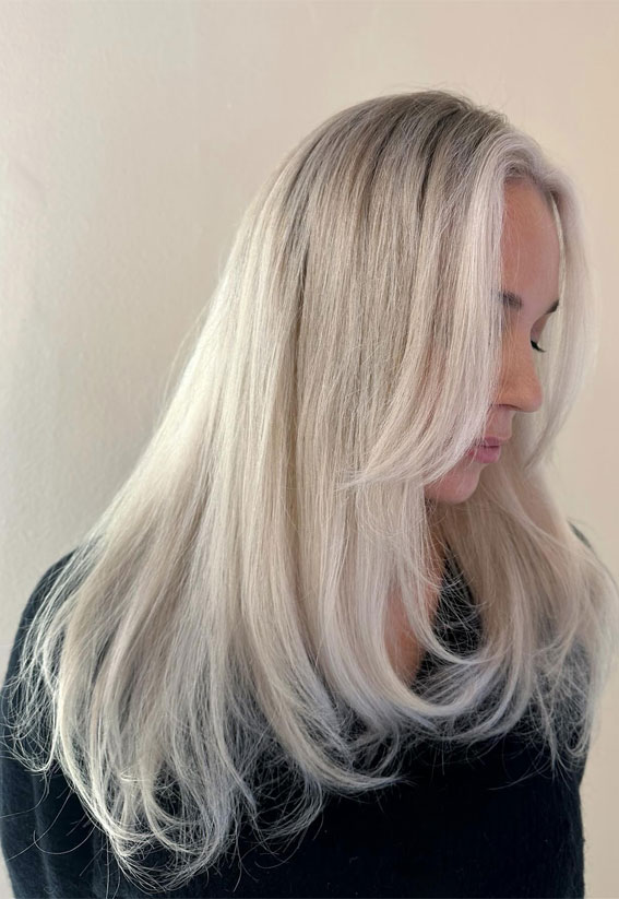 Scandinavian blonde layered haircut, long layered haircut, long straight hairstyle