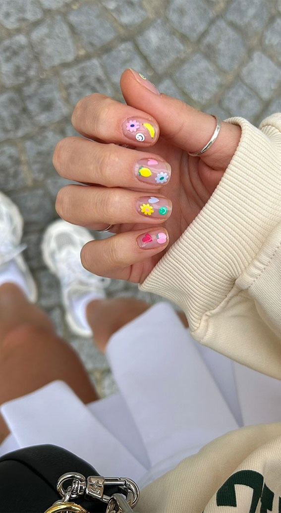 35 Creative Nail Art Inspirations to Transform Your Tips : Adorable Short Nails with Playful Elements