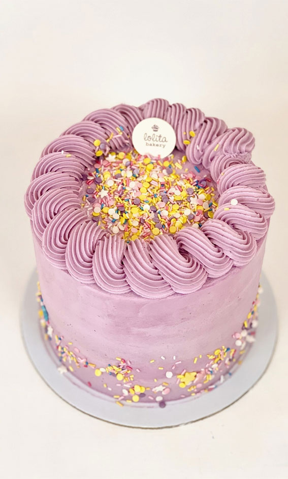 lilac confetti cake, vibrant cake, colorful birthday cake, confetti cake, funfetti cake, sprinkle cake, simple sprinkle cake ideas, simple funfetti cake,  2 layer confetti cake, colourful sprinkle cake, best sprinkles funfetti cake, what kind of sprinkles for funfetti cake