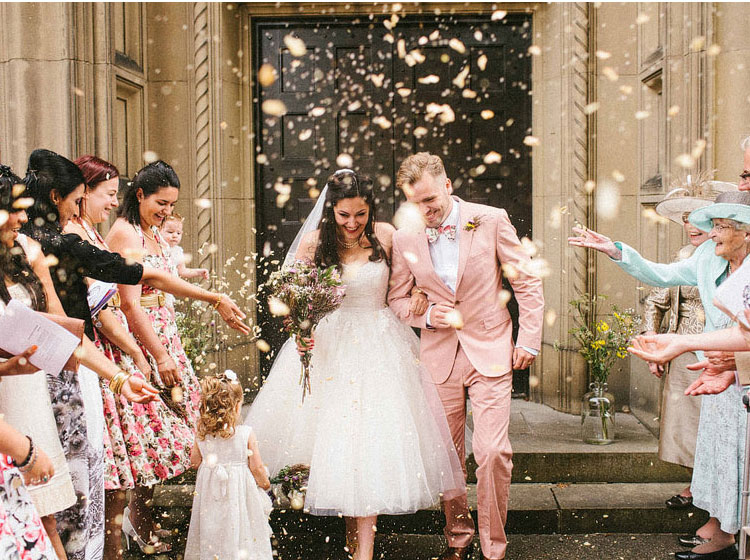 confetti throw at bride and groom