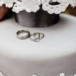 wedding rings on wedding cake