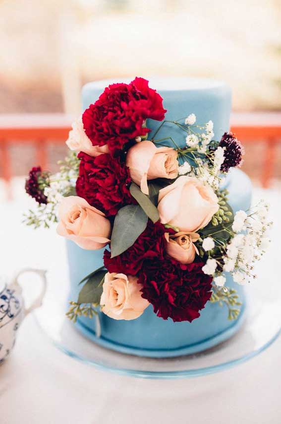 Misty blue wedding cake with red floral accents #wedding cake #dustyblue